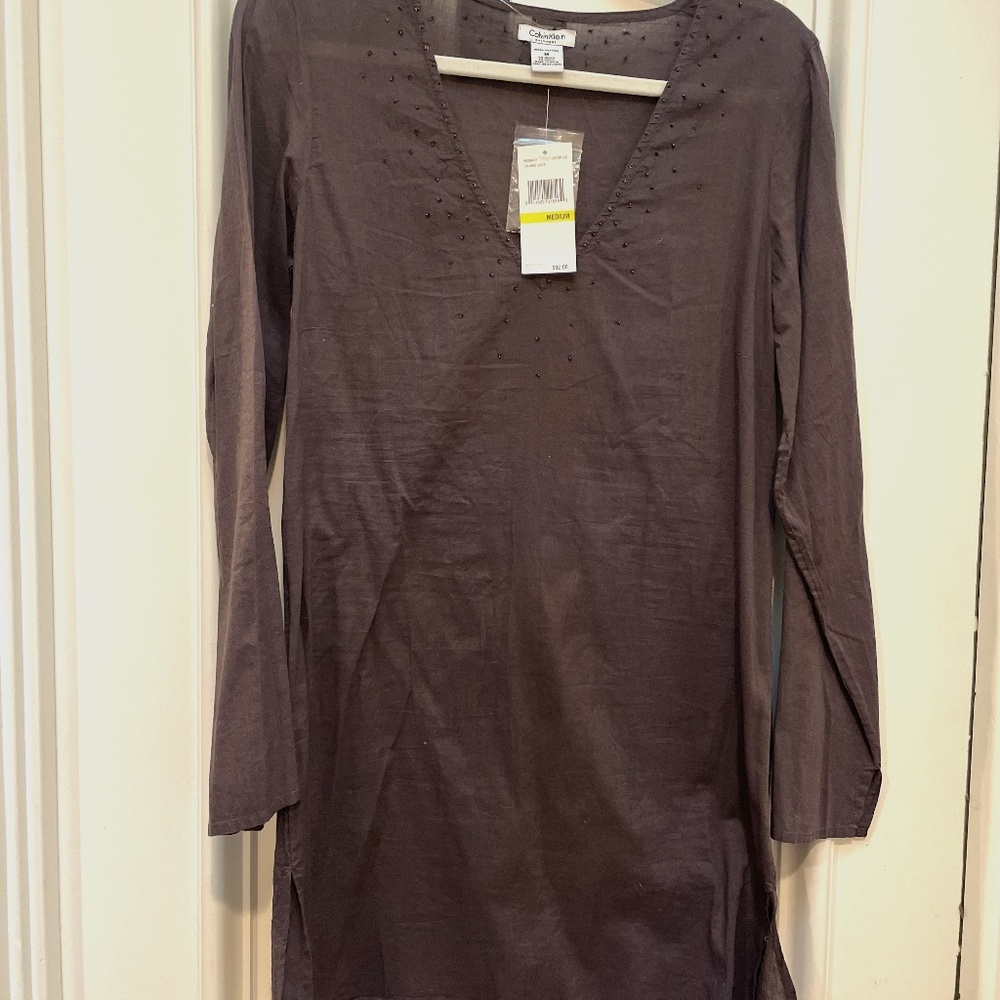 Lightweight Calvin Klein Beach/Pool Cover-up v-neck with beaded detail.